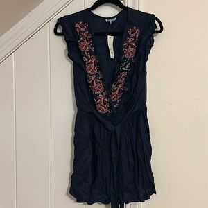 Francesca’s Navy Cross Stitched Romper